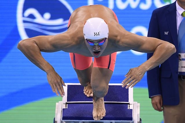 China's Sun Yang competes in the Men's 200m Freestyle Final during the swimming event at the Rio 2016 Olympic Games at the Olympic Aquatics Stadium in Rio de Janeiro on August 8, 2016. / AFP PHOTO / GABRIEL BOUYS